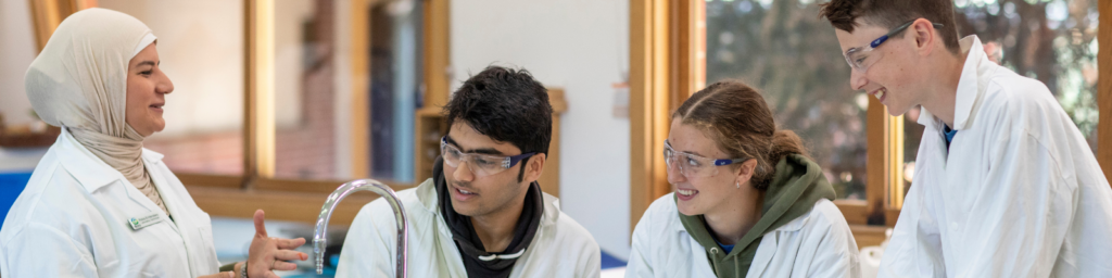 Senior school students in the science lab with teacher