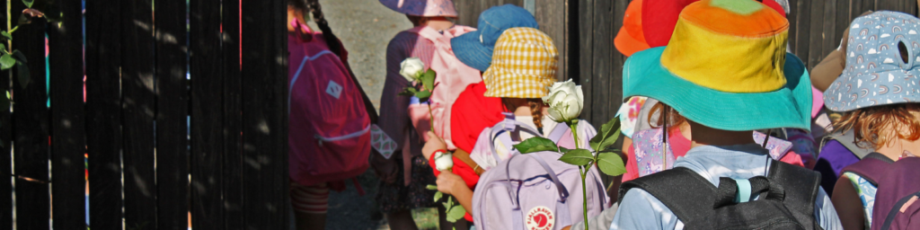class 1 students are given roses on their first day of school